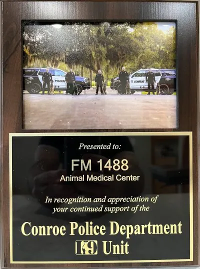 Conroe Police Department recognition of FM 1488 Animal Medical Center for supporting its K-9 Officer Unit