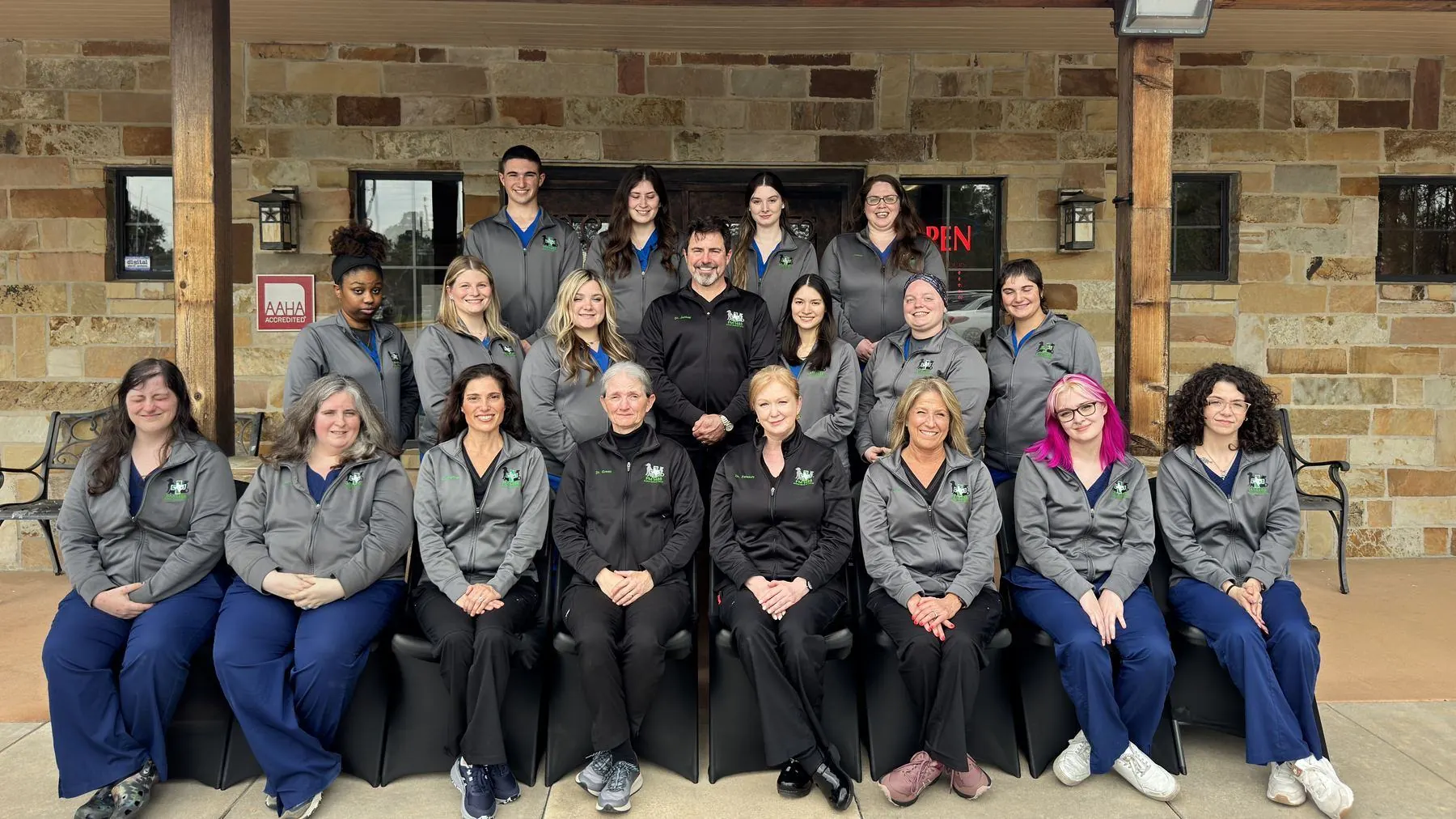The FM 1488 Animal Medical Center team in front of the hospital on FM 1488 in Magnolia, Texas
